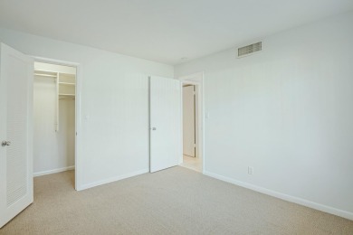 This stunning 2-bedroom, 2-bathroom condo is located on the on Fountains Golf and Country Club in Florida - for sale on GolfHomes.com, golf home, golf lot