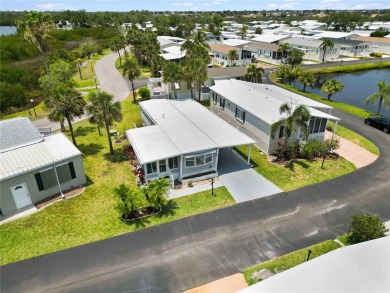 Step into the epitome of coastal charm and comfort with this on Twin Isles Country Club in Florida - for sale on GolfHomes.com, golf home, golf lot