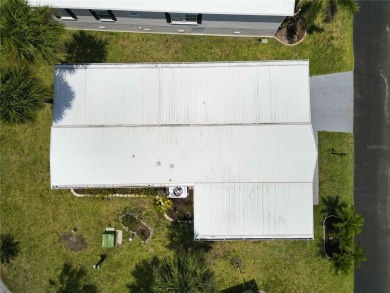 Step into the epitome of coastal charm and comfort with this on Twin Isles Country Club in Florida - for sale on GolfHomes.com, golf home, golf lot