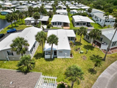 Step into the epitome of coastal charm and comfort with this on Twin Isles Country Club in Florida - for sale on GolfHomes.com, golf home, golf lot