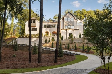 Perched atop a commanding hilltop setting in Atlanta Country on Atlanta Country Club in Georgia - for sale on GolfHomes.com, golf home, golf lot
