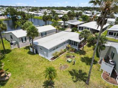 Step into the epitome of coastal charm and comfort with this on Twin Isles Country Club in Florida - for sale on GolfHomes.com, golf home, golf lot