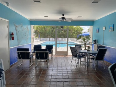 This stunning 2-bedroom, 2-bathroom condo is located on the on Fountains Golf and Country Club in Florida - for sale on GolfHomes.com, golf home, golf lot