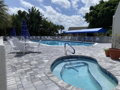 This stunning 2-bedroom, 2-bathroom condo is located on the on Fountains Golf and Country Club in Florida - for sale on GolfHomes.com, golf home, golf lot