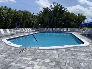 This stunning 2-bedroom, 2-bathroom condo is located on the on Fountains Golf and Country Club in Florida - for sale on GolfHomes.com, golf home, golf lot