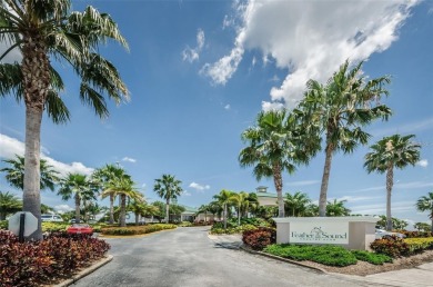 Welcome to your dream townhome that overlooks the 17th green of on Feather Sound Country Club in Florida - for sale on GolfHomes.com, golf home, golf lot