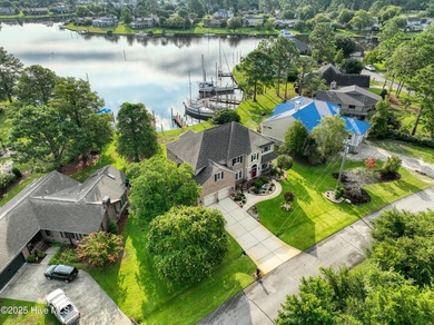 Welcome to this stunning home in Fairfield Harbour, a premier on Harbour Point Golf Club in North Carolina - for sale on GolfHomes.com, golf home, golf lot