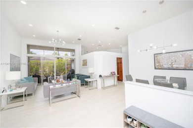 Discover this stunning one-story estate in Weston Hills on Weston Hills Country Club in Florida - for sale on GolfHomes.com, golf home, golf lot