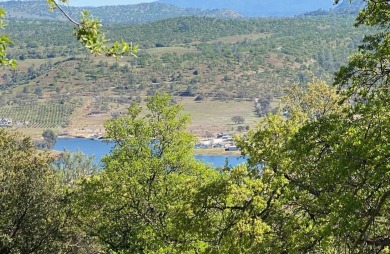Soak Up the Views of Lake Tulloch from the upper portion of this on The Club at Copper Valley Golf Course in California - for sale on GolfHomes.com, golf home, golf lot