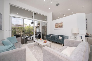 Discover this stunning one-story estate in Weston Hills on Weston Hills Country Club in Florida - for sale on GolfHomes.com, golf home, golf lot