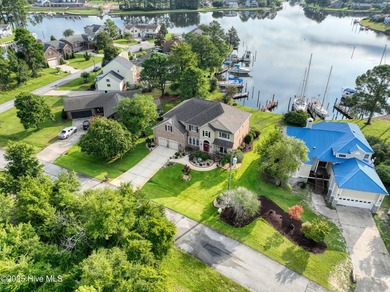 Welcome to this stunning home in Fairfield Harbour, a premier on Harbour Point Golf Club in North Carolina - for sale on GolfHomes.com, golf home, golf lot