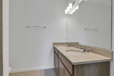 One or more photo(s) has been virtually staged. The Bradley on Fishermans Cove Golf and Marina in Florida - for sale on GolfHomes.com, golf home, golf lot