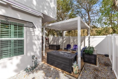 Welcome to this beautifully designed 3-bedroom, 2-bathroom home on Winter Park Country Club in Florida - for sale on GolfHomes.com, golf home, golf lot