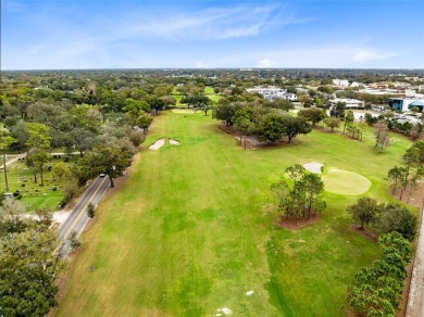 Welcome to this beautifully designed 3-bedroom, 2-bathroom home on Winter Park Country Club in Florida - for sale on GolfHomes.com, golf home, golf lot