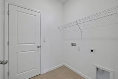 One or more photo(s) has been virtually staged. The Bradley on Fishermans Cove Golf and Marina in Florida - for sale on GolfHomes.com, golf home, golf lot