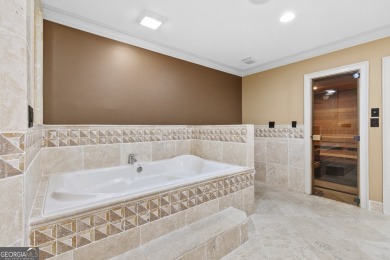 EXQUISITE LUXURY LIVING IN ST MARLO COUNTRY CLUB! This all-brick on St. Marlo Country Club in Georgia - for sale on GolfHomes.com, golf home, golf lot