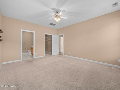 This thoughtfully designed 3-bedroom, 2-bath single-level condo on Brandywine Bay Golf Club in North Carolina - for sale on GolfHomes.com, golf home, golf lot