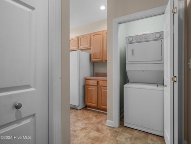 This thoughtfully designed 3-bedroom, 2-bath single-level condo on Brandywine Bay Golf Club in North Carolina - for sale on GolfHomes.com, golf home, golf lot