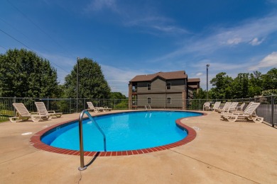 This spacious condo has a Great floorplan and a Garage! View the on Ledgestone Country Club and Golf Course in Missouri - for sale on GolfHomes.com, golf home, golf lot