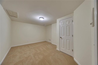 Stunning 5-Bedroom Home in Towne Lake Hills North - on Towne Lake Hills Golf Club in Georgia - for sale on GolfHomes.com, golf home, golf lot