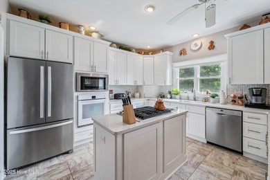 Welcome to this stunning home in Fairfield Harbour, a premier on Harbour Point Golf Club in North Carolina - for sale on GolfHomes.com, golf home, golf lot