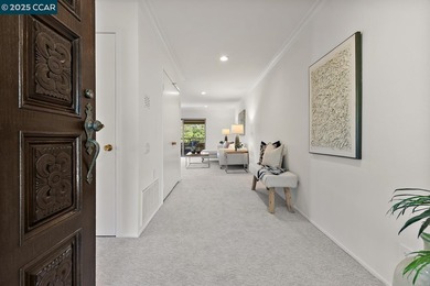 Welcome to the Villa Barcelona, a lovely top-floor condo in on Rossmoor Golf Course in California - for sale on GolfHomes.com, golf home, golf lot