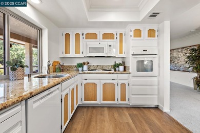 Welcome to the Villa Barcelona, a lovely top-floor condo in on Rossmoor Golf Course in California - for sale on GolfHomes.com, golf home, golf lot