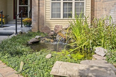 Springtime Serenity in StoneBridge Village! Welcome to your on Ledgestone Country Club and Golf Course in Missouri - for sale on GolfHomes.com, golf home, golf lot