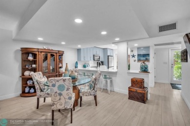 Experience modern elegance in this beautifully updated 2-bedroom on Palm-Aire Country Club and Resort - The Oaks in Florida - for sale on GolfHomes.com, golf home, golf lot