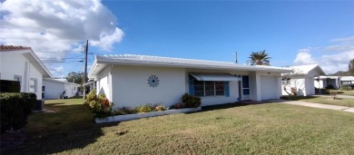 Under contract-accepting backup offers. This spacious home is on Mainlands Golf Club in Florida - for sale on GolfHomes.com, golf home, golf lot