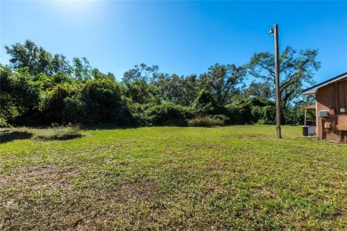 Under contract-accepting backup offers. Charming Home in on River Hills Country Club in Florida - for sale on GolfHomes.com, golf home, golf lot