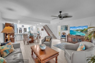 Experience modern elegance in this beautifully updated 2-bedroom on Palm-Aire Country Club and Resort - The Oaks in Florida - for sale on GolfHomes.com, golf home, golf lot