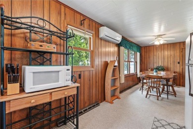 Experience Pelican Lake life at this furnished 2-bedroom on Deacons Lodge Golf Course in Minnesota - for sale on GolfHomes.com, golf home, golf lot