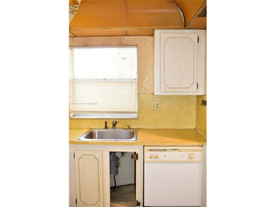 Ready to make a great deal and buy a 2 bedroom unit, roll up on Sunrise Lakes Phase III in Florida - for sale on GolfHomes.com, golf home, golf lot