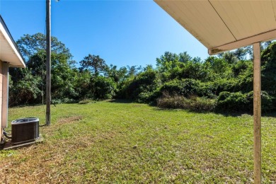 Under contract-accepting backup offers. Charming Home in on River Hills Country Club in Florida - for sale on GolfHomes.com, golf home, golf lot