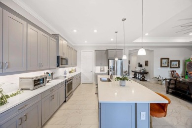 Enjoy refined Florida living in this impeccably maintained on Eagle Lakes Golf Club in Florida - for sale on GolfHomes.com, golf home, golf lot
