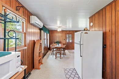 Experience Pelican Lake life at this furnished 2-bedroom on Deacons Lodge Golf Course in Minnesota - for sale on GolfHomes.com, golf home, golf lot
