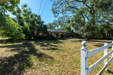 Under contract-accepting backup offers. Charming Home in on River Hills Country Club in Florida - for sale on GolfHomes.com, golf home, golf lot