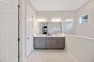 Enjoy refined Florida living in this impeccably maintained on Eagle Lakes Golf Club in Florida - for sale on GolfHomes.com, golf home, golf lot