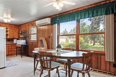 Experience Pelican Lake life at this furnished 2-bedroom on Deacons Lodge Golf Course in Minnesota - for sale on GolfHomes.com, golf home, golf lot