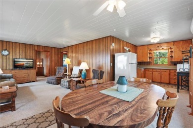 Experience Pelican Lake life at this furnished 2-bedroom on Deacons Lodge Golf Course in Minnesota - for sale on GolfHomes.com, golf home, golf lot
