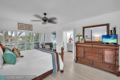 Experience modern elegance in this beautifully updated 2-bedroom on Palm-Aire Country Club and Resort - The Oaks in Florida - for sale on GolfHomes.com, golf home, golf lot