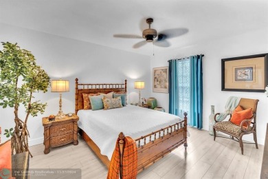 Experience modern elegance in this beautifully updated 2-bedroom on Palm-Aire Country Club and Resort - The Oaks in Florida - for sale on GolfHomes.com, golf home, golf lot