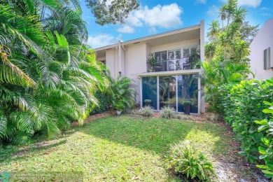 Experience modern elegance in this beautifully updated 2-bedroom on Palm-Aire Country Club and Resort - The Oaks in Florida - for sale on GolfHomes.com, golf home, golf lot