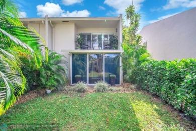 Experience modern elegance in this beautifully updated 2-bedroom on Palm-Aire Country Club and Resort - The Oaks in Florida - for sale on GolfHomes.com, golf home, golf lot