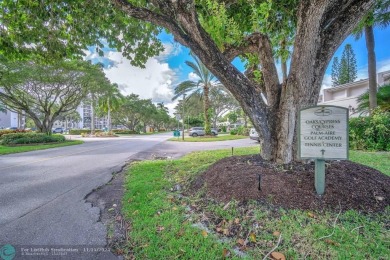 Experience modern elegance in this beautifully updated 2-bedroom on Palm-Aire Country Club and Resort - The Oaks in Florida - for sale on GolfHomes.com, golf home, golf lot