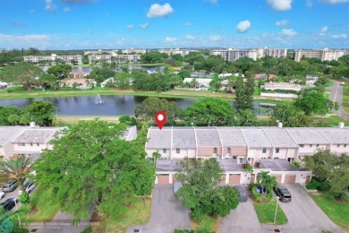 Experience modern elegance in this beautifully updated 2-bedroom on Palm-Aire Country Club and Resort - The Oaks in Florida - for sale on GolfHomes.com, golf home, golf lot