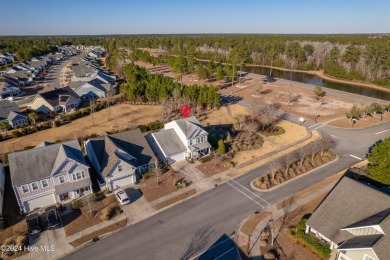 Discover this beautifully maintained 3- Bedroom, 3.5 bathroom on Cape Fear National At Brunswick Forest in North Carolina - for sale on GolfHomes.com, golf home, golf lot