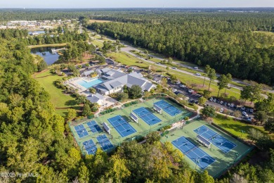 Discover this beautifully maintained 3- Bedroom, 3.5 bathroom on Cape Fear National At Brunswick Forest in North Carolina - for sale on GolfHomes.com, golf home, golf lot