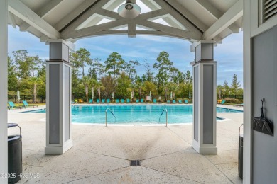 Discover this beautifully maintained 3- Bedroom, 3.5 bathroom on Cape Fear National At Brunswick Forest in North Carolina - for sale on GolfHomes.com, golf home, golf lot